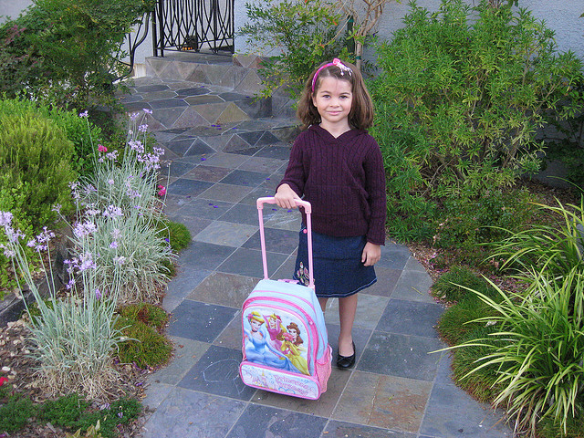 Thomas Kriese First day of school - a First Grader! Ready to wheel the bag over to the elementary school. She's so grown up now! https://www.flickr.com/photos/thomaspix/2821978334